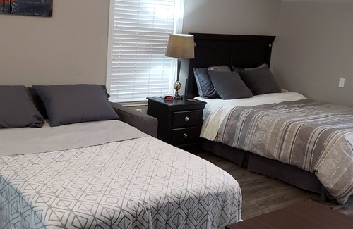 North Central Westminster Apartment | Gorgeous Bradburn Red Carriage House with Huge Deck, Carport and W/D