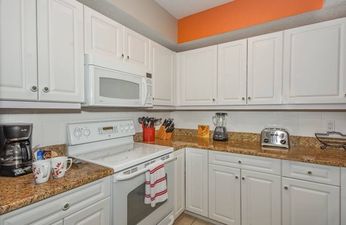 New Smyrna Beach Condo | Gorgeous Coastal Themed Condo with Views of the Estuary! OW10-303