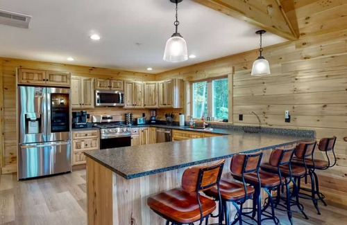 Carrabassett Valley Cabin | Gorgeous dog-friendly cabin with great view, deck, hot tub, & gas fireplace