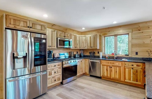 Carrabassett Valley Cabin | Gorgeous dog-friendly cabin with great view, deck, hot tub, & gas fireplace