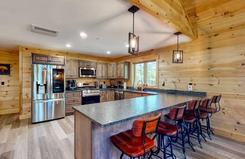 Carrabassett Valley Cabin | Gorgeous dog-friendly cabin with great view, deck, hot tub, & gas fireplace