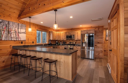 Carrabassett Valley Cabin | Gorgeous dog-friendly cabin with great view, deck, hot tub, & gas fireplace