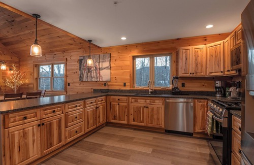 Carrabassett Valley Cabin | Gorgeous dog-friendly cabin with great view, deck, hot tub, & gas fireplace