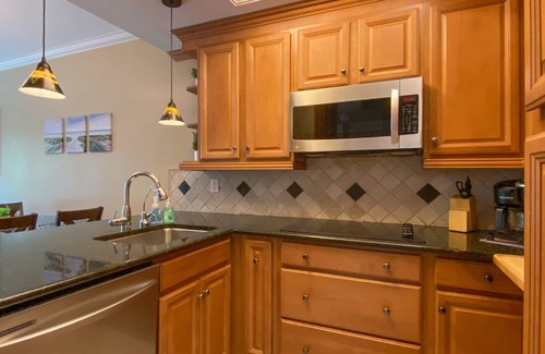Central Naples Condo | Gorgeous Ground Floor Condo in World Class Resort, Pool, Spa, Amenities Galore!