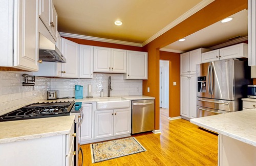 Ocean Pines House | Gorgeous home with an enclosed yard, grill, fireplace, chef's kitchen, AC, & W/D