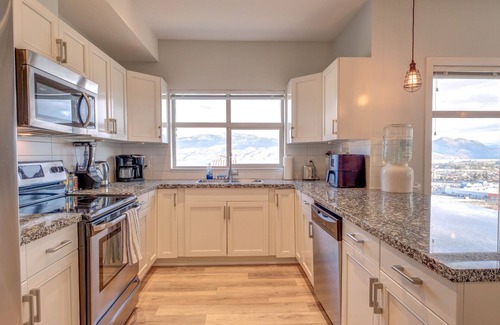 Central Okanagan Condo | Gorgeous Lake and Mountain Views