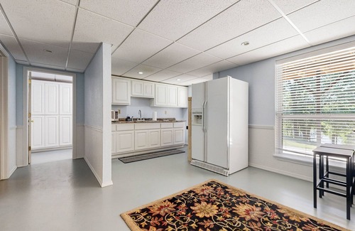 Hoyt House | Gorgeous Lakefront Home, private dock and short walk to beach