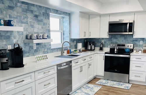 South Patrick Shores Condo | Gorgeous Ocean and Launch Views from top floor. Condo Completely Remodeled.