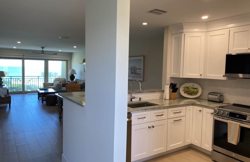Central Beach Condo | Gorgeous Ocean Views, Walk to Town, COMPLETE RENOVATION in 2023!