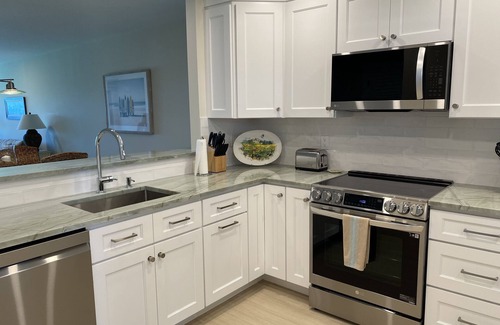 Central Beach Condo | Gorgeous Ocean Views, Walk to Town, COMPLETE RENOVATION in 2023!