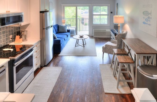 The Pines Condo | Gorgeous renovated property in town & walking distance to the beach & shops