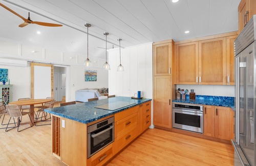 Kalama Tract House | Gorgeous Renovated 1937 Plantation Style Beach House 50 Steps to the Center of the Beach by RedAwning