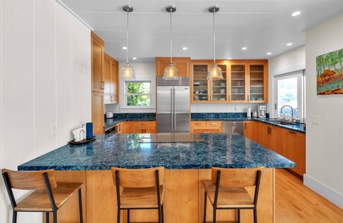Kalama Tract House | Gorgeous Renovated 1937 Plantation Style Beach House 50 Steps to the Center of the Beach by RedAwning