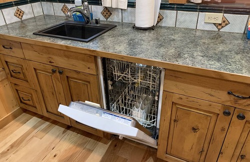 Ashford Cabin | Gorgeous secluded cabin 2 miles from Mt. Rainier National Park. Private hot tub overlooking Copper Creek. No other buildings in sight! Pet friendly. Children welcome. Two bedrooms, full kitchen, big deck with creek views.