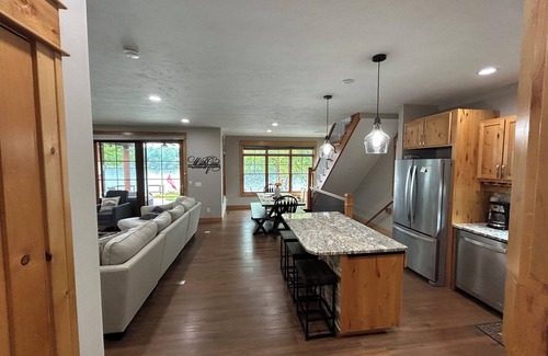 Newaygo House | Gorgeous waterfront 4-BR home with adorable Tiny House and pickleball court!