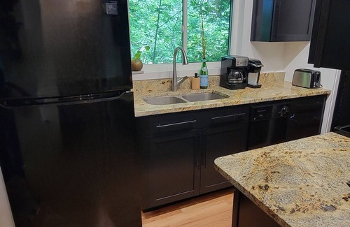 Traverse City House | Gorgeous wooded site 15 min from the heart of Traverse City.walk to swimming!