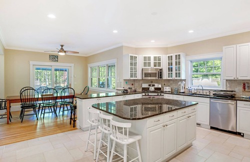 Wainscott Woods House | Gourmet Eat-In Kitchen, Master Suite, Fieldstone Patios