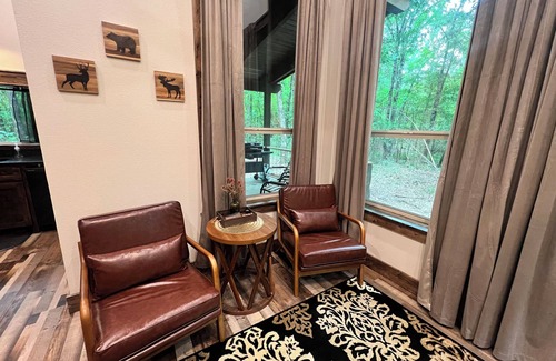 Muse Cabin | Grab your ATV, hiking boots, or a good book and escape to nature.