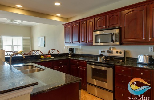 Estate Enighed Condo | Grande Bay Waterfront Condo