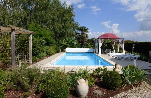 Saint-Jouin-de-Marnes House | Grande Maison des Tournesols. 5 bedroom gite with heated private pool, sleeps 11