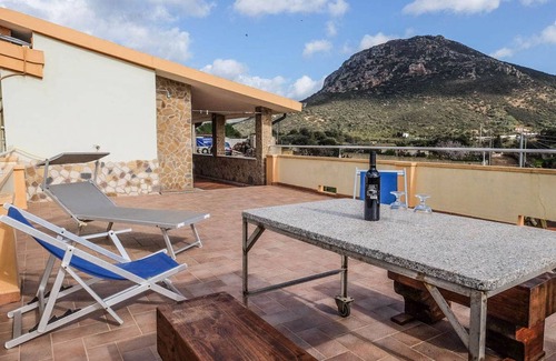 Gonnesa Apartment | Granny flat - one-room apartment souterrain with sun terrace on the outskirts