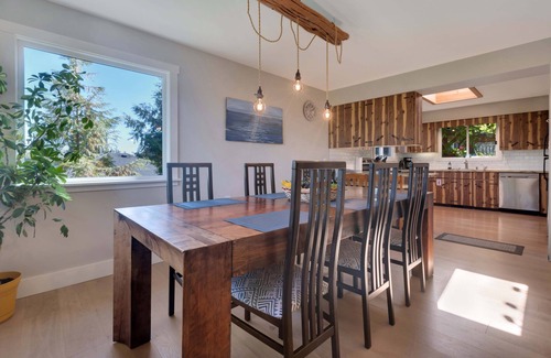 Ucluelet House | Grapevine Guest House. A west coast home featuring a 25 year old grapevine.