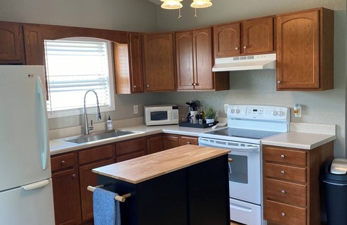 Jacksboro Cabin | Gravel Parking for Boats/Atv, single slip, located near Indian River Marina