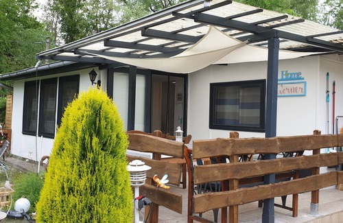 Gotz House | Great bungalow on the water (terrace, garden, beach, boat, bicycles, etc.)
