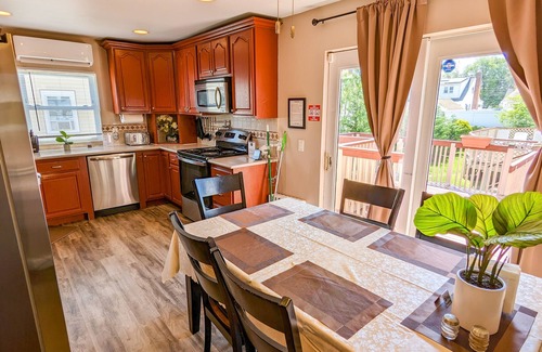 East Massapequa House | Great Family Times In this lovely Cape with Resort style backyard