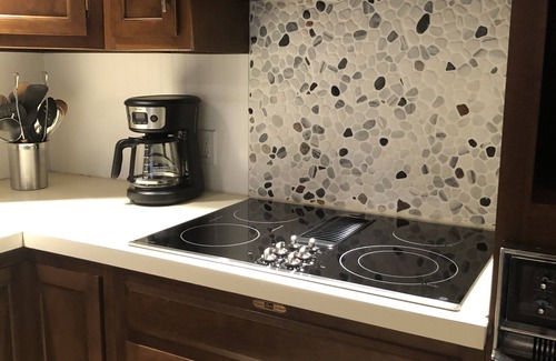 Empire House | Great Glen Arbor location! Private wooded setting, quick walk to town! Sleeps 9