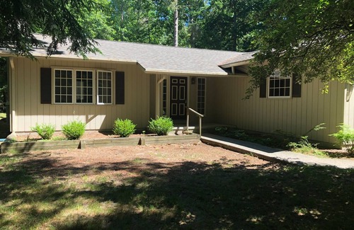 Empire House | Great Glen Arbor location! Private wooded setting, quick walk to town! Sleeps 9