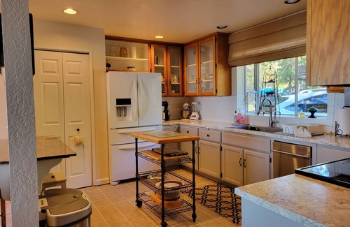 Nice Cottage | Great Price! Sunset Beach Cottage with Lovely garden, beach, and boat dock!