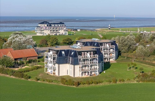 Wremen Apartment | Great, quiet apartment near the beach with sauna and balcony with dike view -