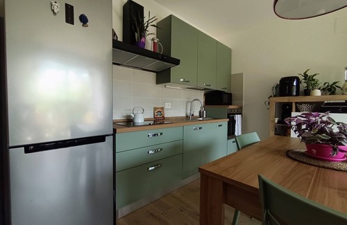 Rozzano Apartment | Green House