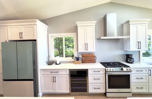 Interlochen House | Green Lake Getaway Lakefront Hot Tub Kayak SUP