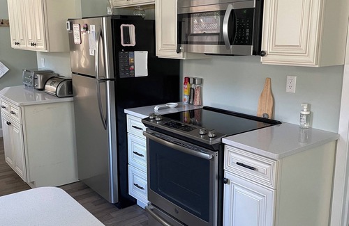 Markesan Cottage | Green Lake Terrace - AC- Fenced Yard -Dog Friendly. 2 short blocks to the beach.