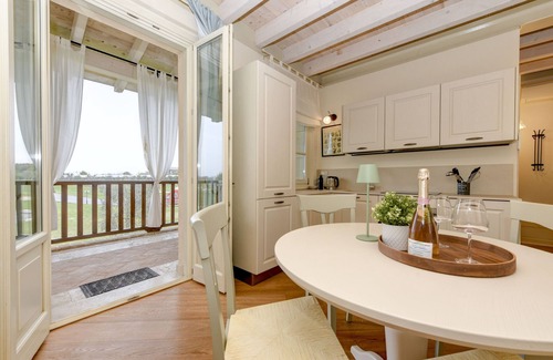 Pozzolengo Apartment | Green Living Apartment Chervo Golf Resort