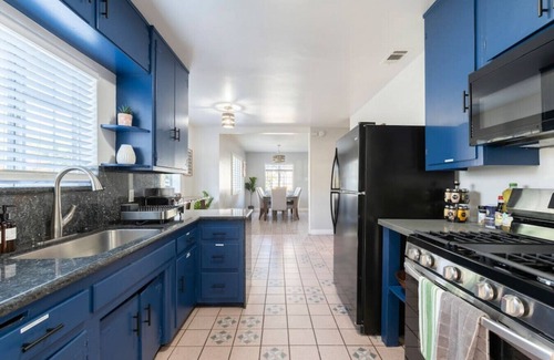 Azusa House | Green Oasis Retreat: 3 Bedrooms, Game Room with Air Hockey, Backyard Paradise with Cornhole, Gazebo, BBQ, and Eclectic Patio Delights