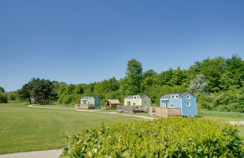 Zeewolde House | Green Tiny House with shared pool