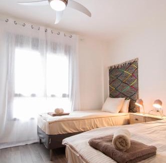 Caleta de Fuste Apartment | Green View Luxury appartment in new complex Pueblo Majorero next to golf course 5 min walk from the Beach and Atlantico Shopping Centre in Caleta de Fuste Next to Cassino and Elba Sara Hotel 2 bedrooms 2 bathrooms huge terace!