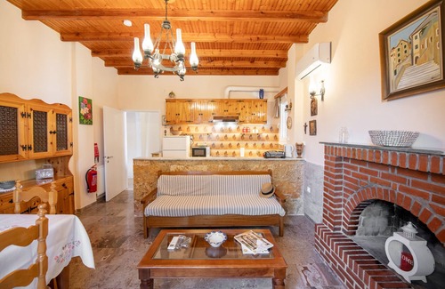Ano Korakiana House | Green Walnut Home in Ano Korakiana is surrounded by nature on a quiet area.
