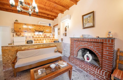Ano Korakiana House | Green Walnut Home in Ano Korakiana is surrounded by nature on a quiet area.