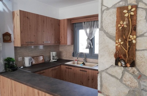Pythagorion Cottage | Grey house