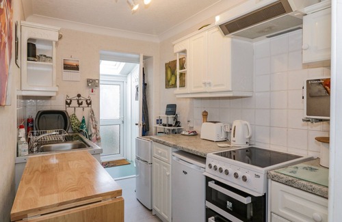 Port William House | GREYSTONES, character holiday cottage, with open fire in Port William