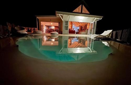 Grotto Bay House | GrottoOnTheRocks