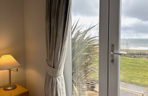 Brora Apartment | Ground floor 2-bedroom spacious apartment overlooking the famous James Braid Brora Golf Course.