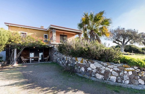 Sant'Antioco Apartment | Ground floor apartment, 2 bedrooms, 1 bathroom, exclusive garden, sea view.