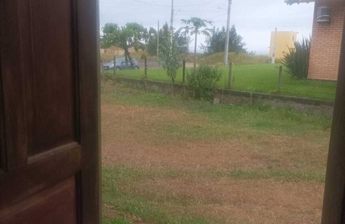 Jaguaruna RV Rental | GROUND FLOOR APARTMENT/SEASIDE APARTMENT-COVERED barbecue. Enjoy the place with shower.Lagoon.Dunes