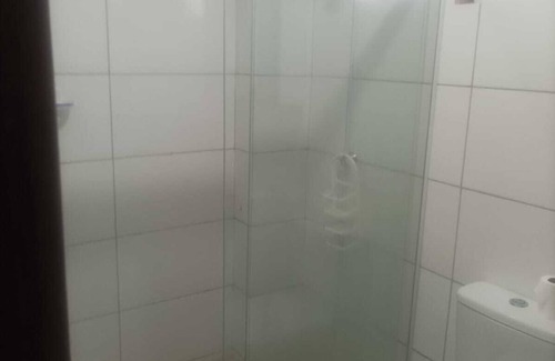 Jaguaruna RV Rental | GROUND FLOOR APARTMENT/SEASIDE APARTMENT-COVERED barbecue. Enjoy the place with shower.Lagoon.Dunes