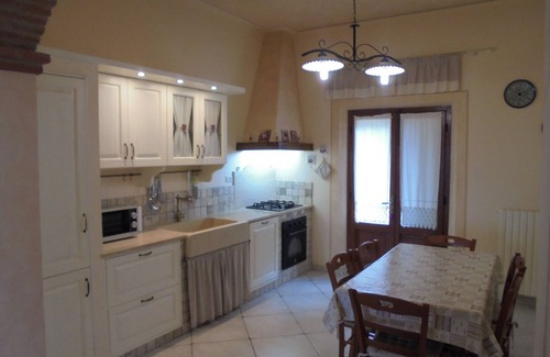 Chianni House | Ground floor apartment with loggia and garden, panoramic view